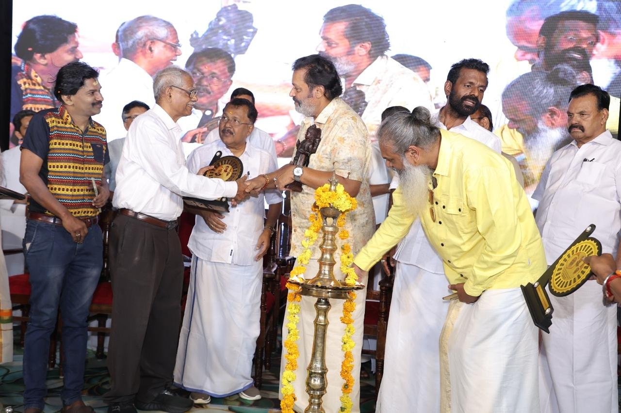 Rtn RC Nair receiving felicitation at a public ceremony